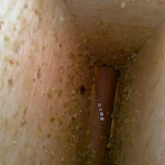  Rullo di legno nella parte inferiore della tramoggia